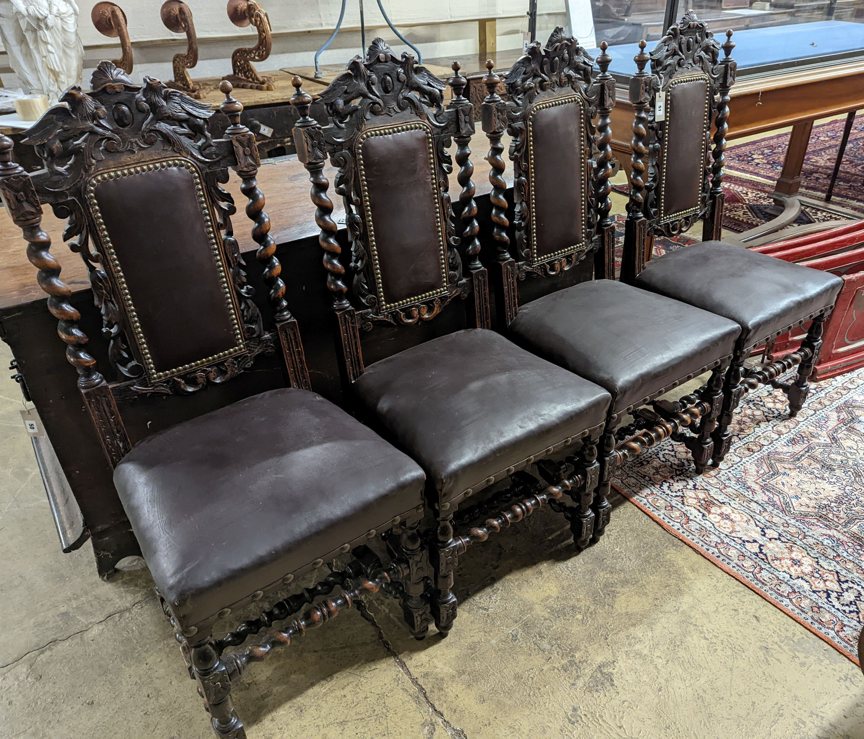 A set of four Flemish style oak Highback dining chairs (1 AF) H-113cm.